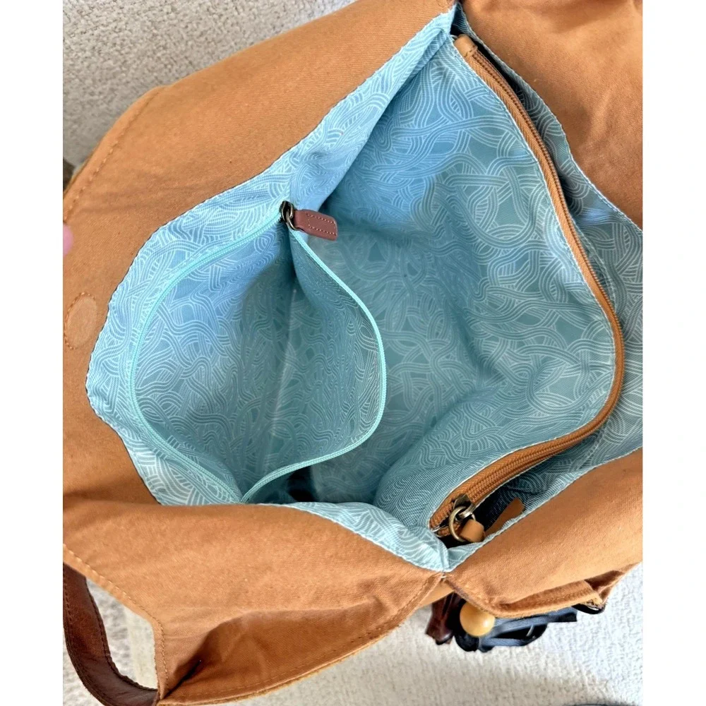 The Sak Women's Huntley‎ Leather Hobo Bag Metro Sling Pebbled Tan with Tassel